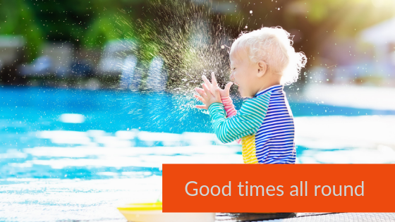 Toddler splashing in pool - baby and toddler friendly cottages, family holidays uk